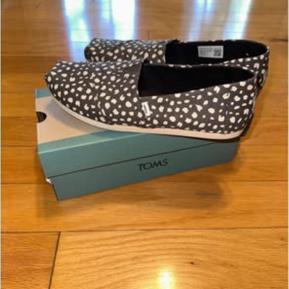 TOMS Black and White Patterned Slip-Ons